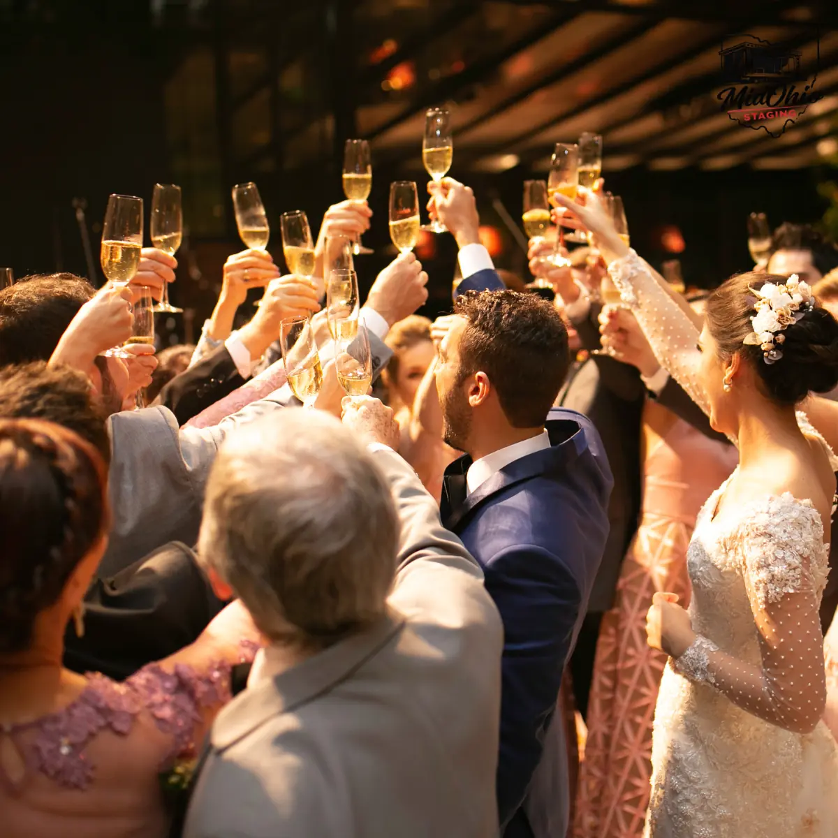 Wedding guests raising a toast at a celebration